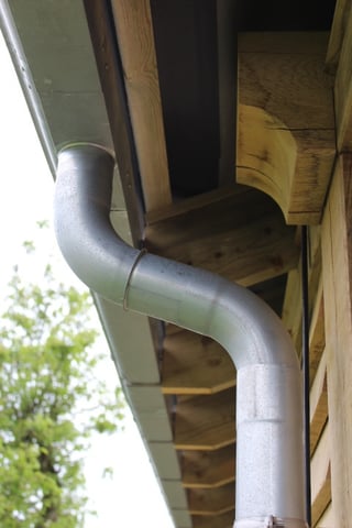 Oak frame with zinc gutter 